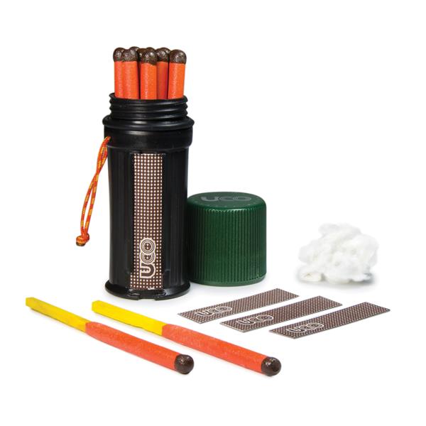 Fan of UCO Titan stormproof matches with red-orange tips spread out on a white background