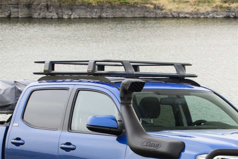 ARB 52x44 steel roof rack cage — loaded with touring gear