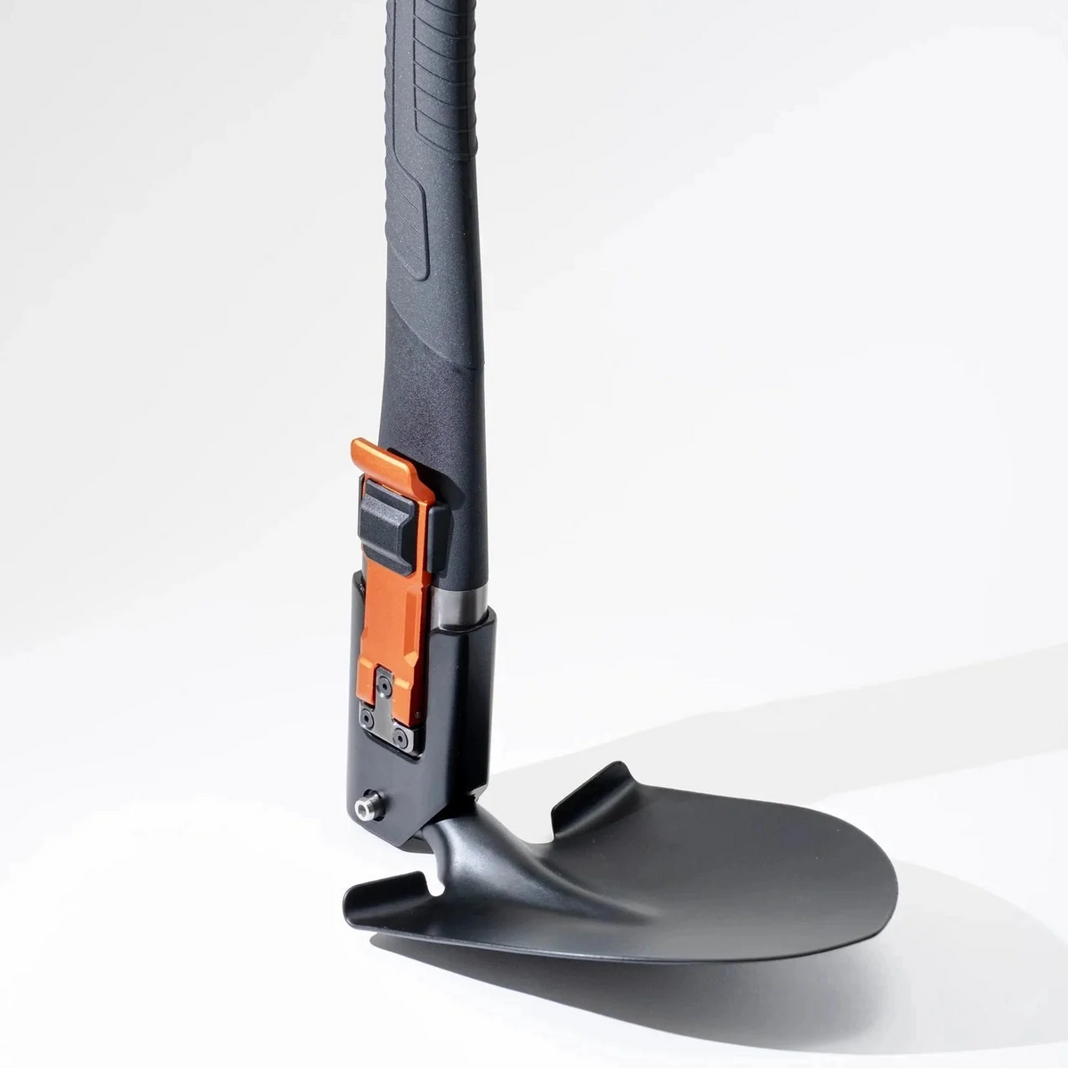 Adventure Mate shovel configuration angled on white, showing the orange lock lever on the handle