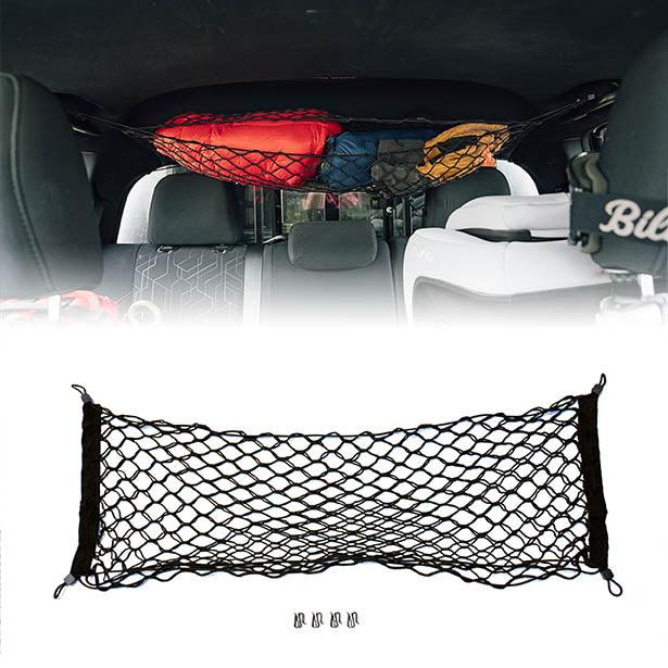 Toyota Tacoma attic storage net installed against the headliner