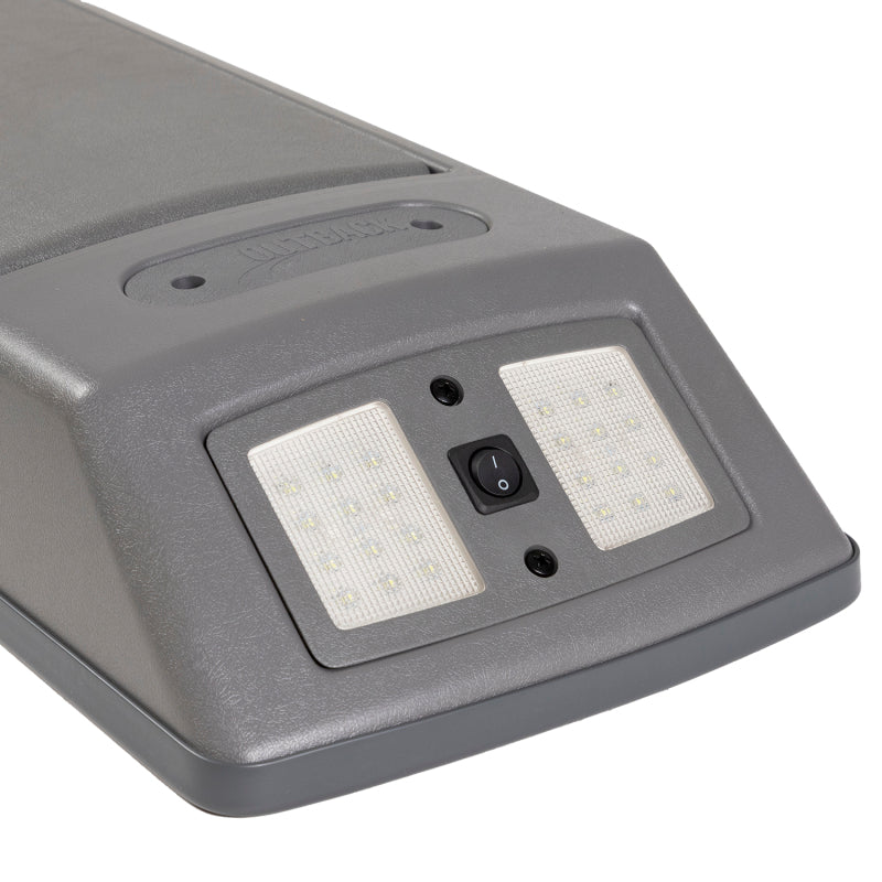 ARB roof console mounted above the rear-view mirror in a Hilux