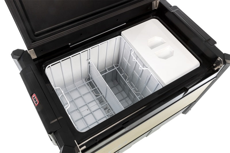 ARB Zero 73 quart fridge freezer with lid open showing baskets