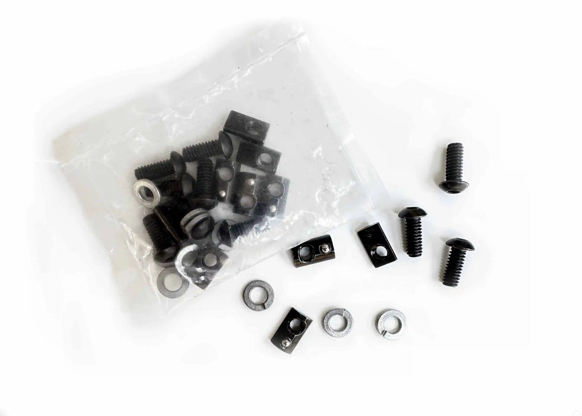 DRIFTR roof rack sliding T-nut hardware kit contents, studio shot of T-nuts, screws, and washers in a bag