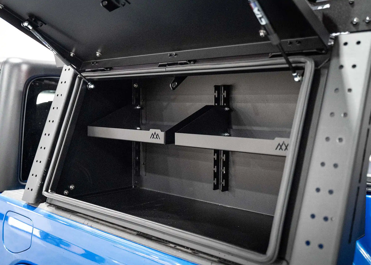 Bed rack storage box interior with the adjustable shelf installed