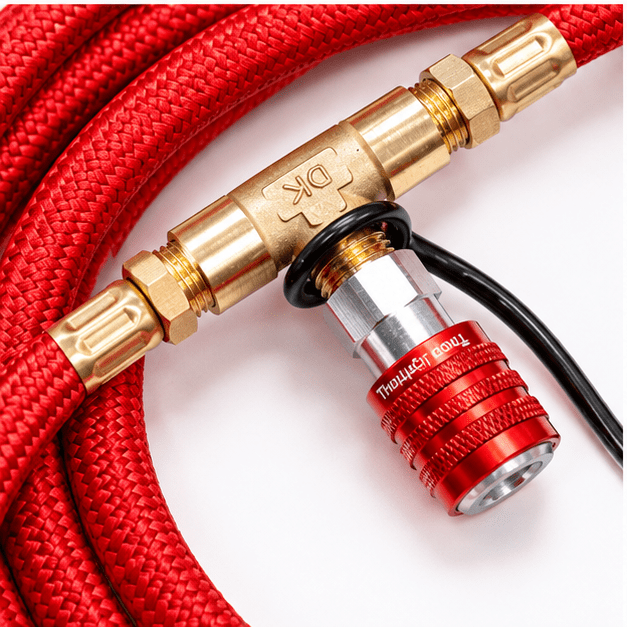 Close-up of a red Thor's Lightning quick-connect fitting on a StrikeShield braided hose