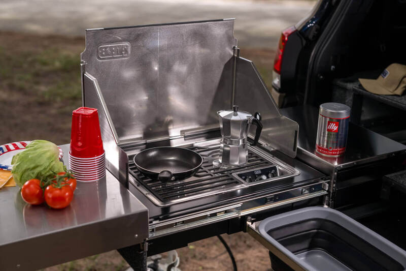 ARB Slide Kitchen Drawer fully deployed with two-burner stove and stainless benchtop