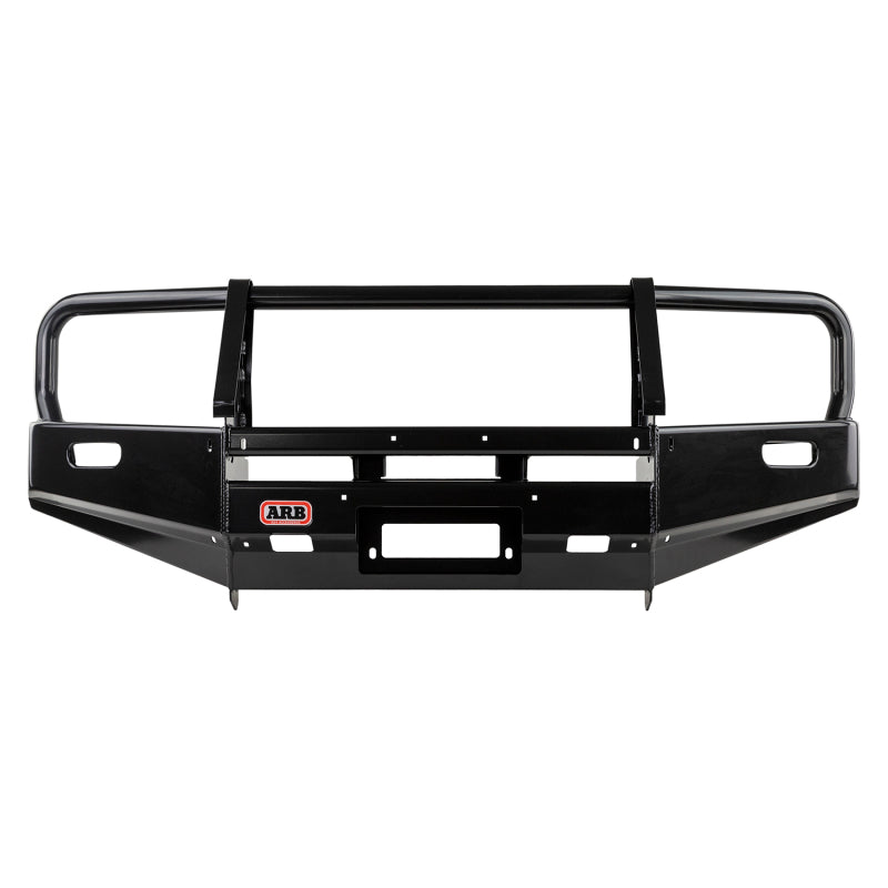 ARB Deluxe combination bumper on a flared Toyota Hilux — front three-quarter view