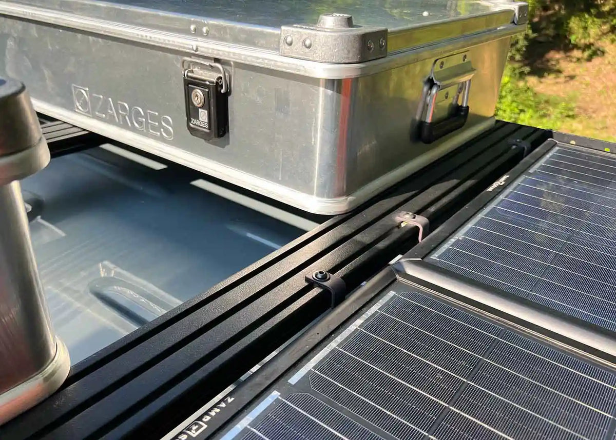 DRIFTR roof rack sliding T-nut hardware installed in a roof rack extrusion channel