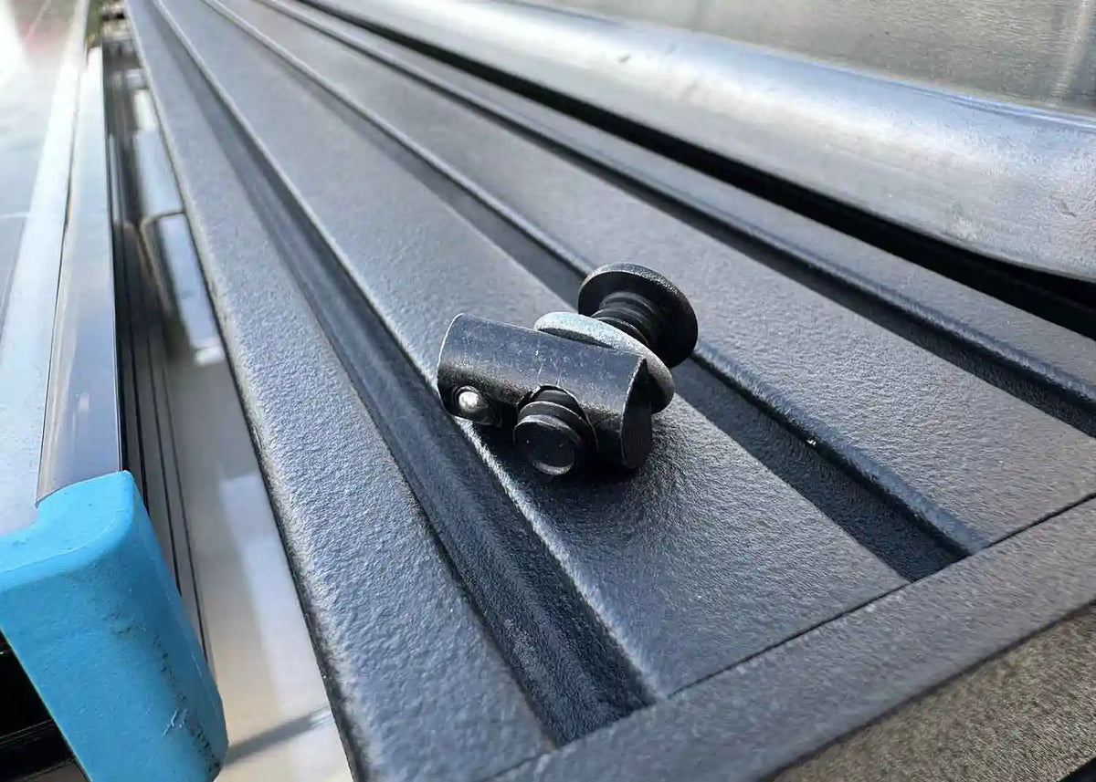 DRIFTR roof rack sliding T-nut hardware kit, close-up of an assembled T-nut and screw