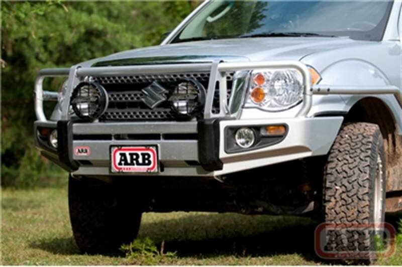 ARB Deluxe winch bumper on a 2009–2012 Suzuki Equator, front view