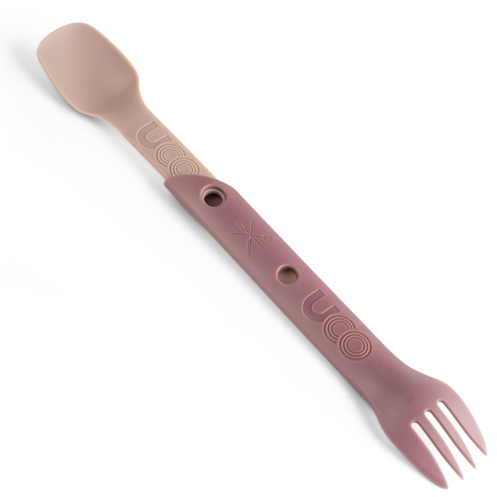 Blush pink UCO Switch Spork shown extended in long-handled mode
