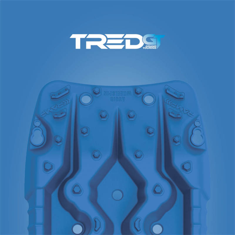 TRED GT recovery board under a vehicle tire during off-road recovery — Blue