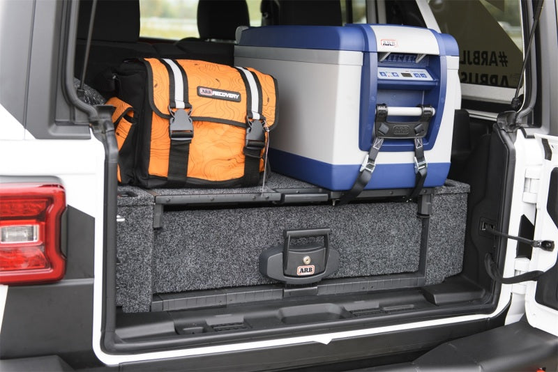 ARB roller drawer side floor kit installed in a Jeep Wrangler JL cargo area