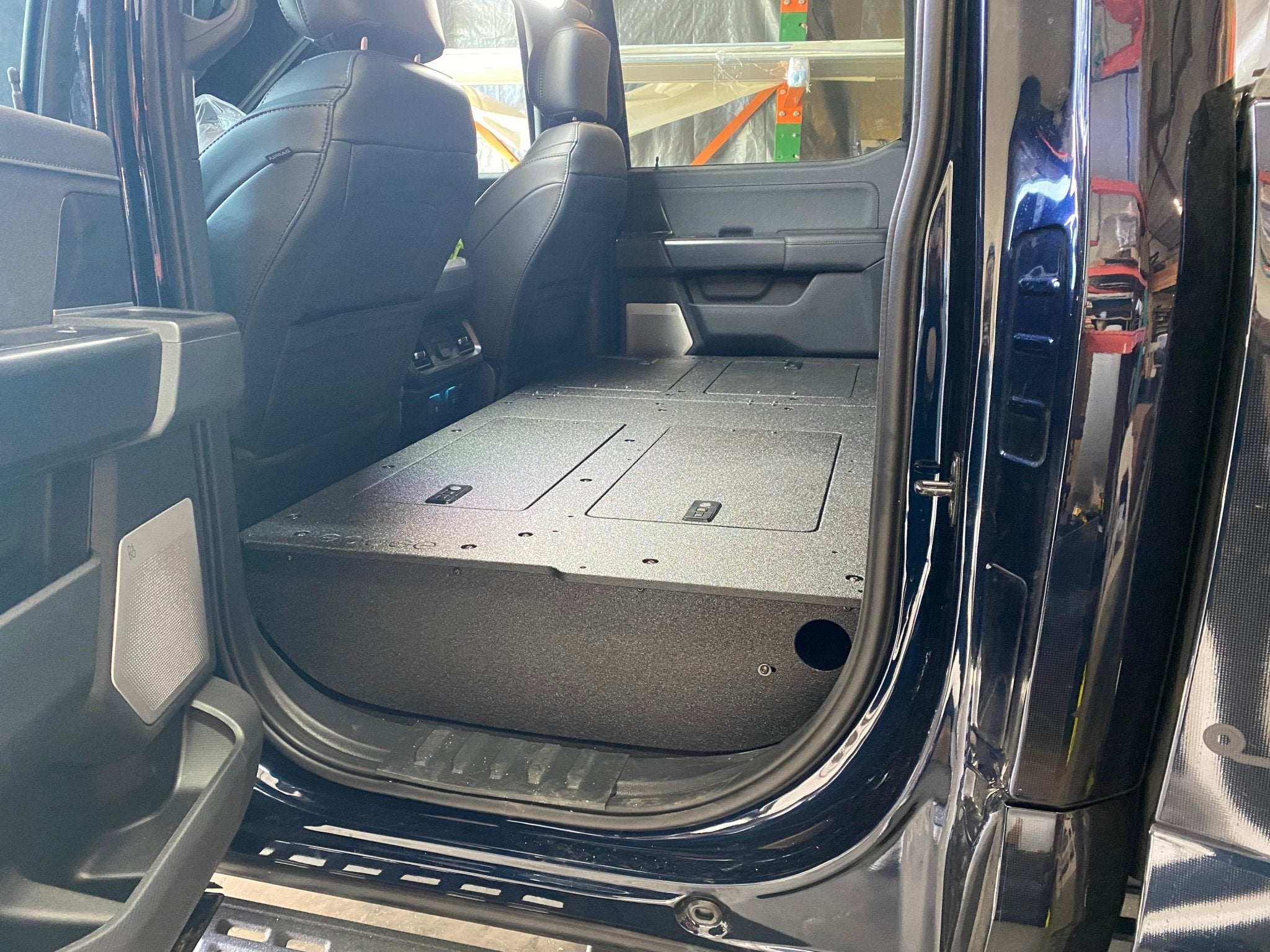 Ford Super Duty Ford - F250-F350 - 2023-Present - 5th Gen. Crew Cab - Second Row Seat Delete Plate System with Factory B&O Subwoofer Center Wall with Exterior Port Seat Delete Plate System Goose Gear- Overland Kitted