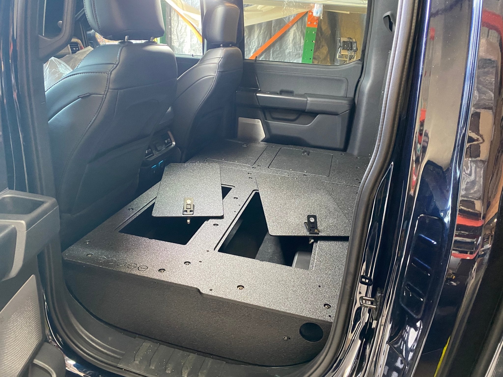 Ford Super Duty Ford - F250-F350 - 2023-Present - 5th Gen. Crew Cab - Second Row Seat Delete Plate System with Factory B&O Subwoofer Center Wall with Exterior Port Seat Delete Plate System Goose Gear- Overland Kitted