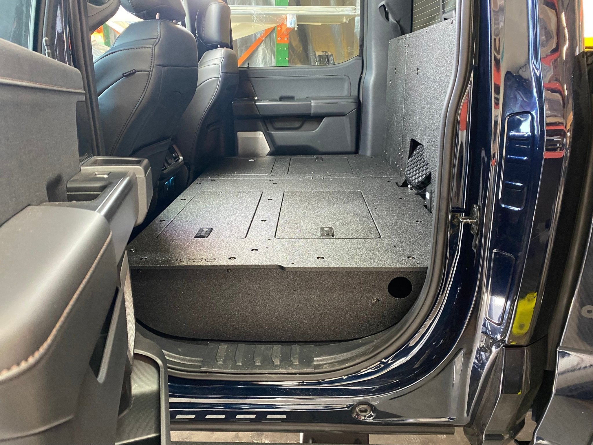 Ford Super Duty Ford - F250-F350 - 2023-Present - 5th Gen. Crew Cab - Second Row Seat Delete Plate System with Factory B&O Subwoofer Center Wall with Exterior Port Seat Delete Plate System Goose Gear- Overland Kitted