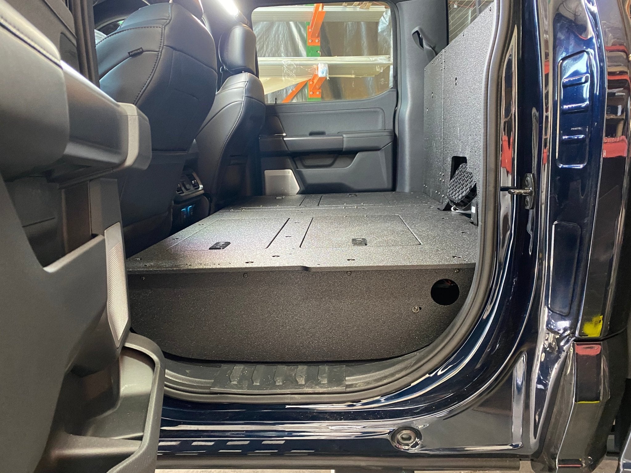 Ford Super Duty Ford - F250-F350 - 2023-Present - 5th Gen. Crew Cab - Second Row Seat Delete Plate System with Factory B&O Subwoofer Center Wall with Exterior Port Seat Delete Plate System Goose Gear- Overland Kitted