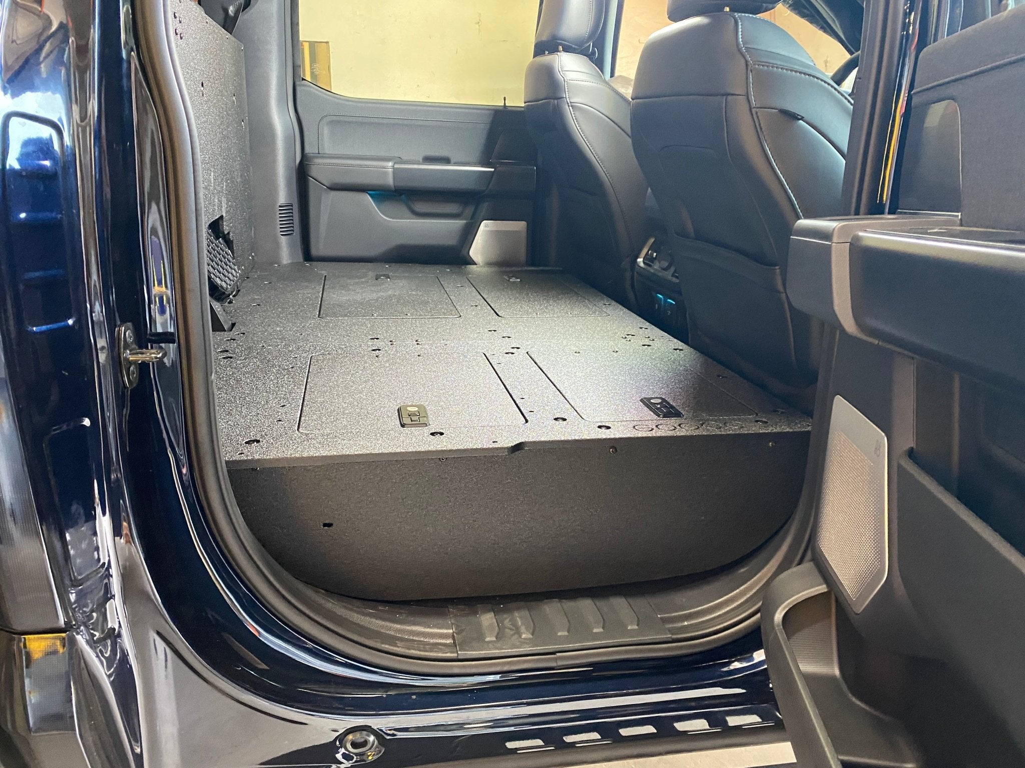 Ford Super Duty Ford - F250-F350 - 2023-Present - 5th Gen. Crew Cab - Second Row Seat Delete Plate System with Factory B&O Subwoofer Center Wall with Exterior Port Seat Delete Plate System Goose Gear- Overland Kitted