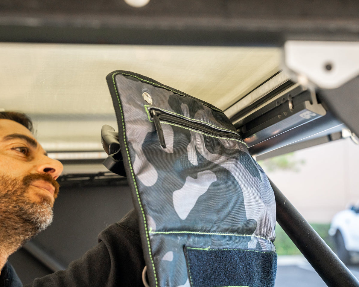 Attaching a soft storage bag to camper L-track with track nuts