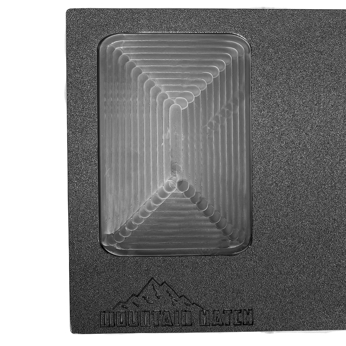 Grab n' Go cutting board detail showing the recessed tray and Mountain Hatch logo