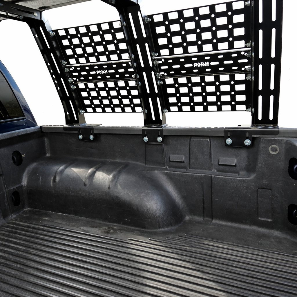 Inside the bed: ROCK-IT rack uprights and MOLLE panels over the wheel well