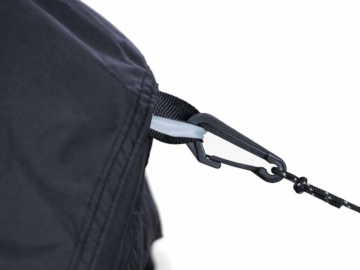C6 Rev Tent storm cover – guy-line clip close-up