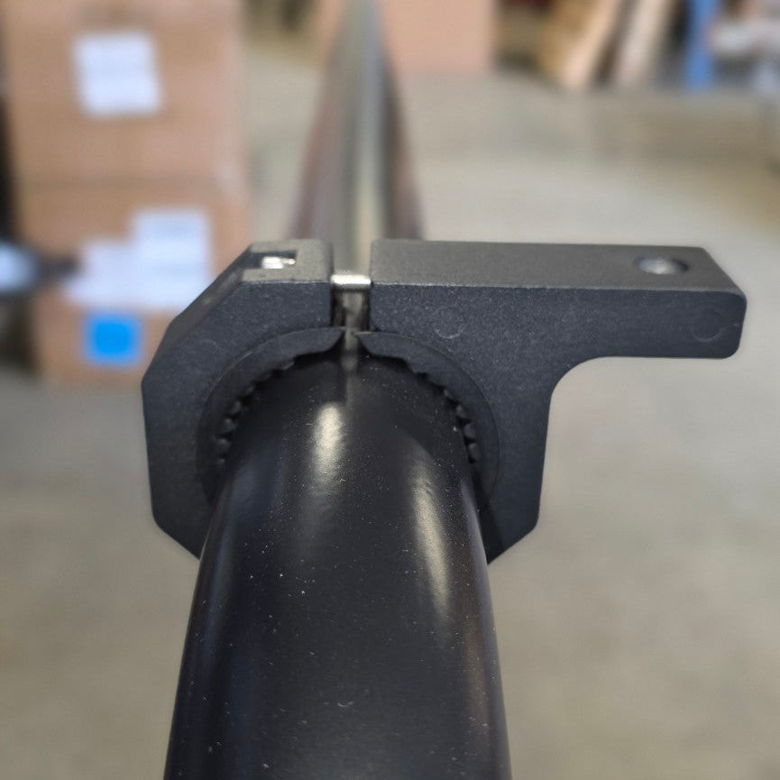 End view of HMOR tube clamp showing the insert and mounting tab