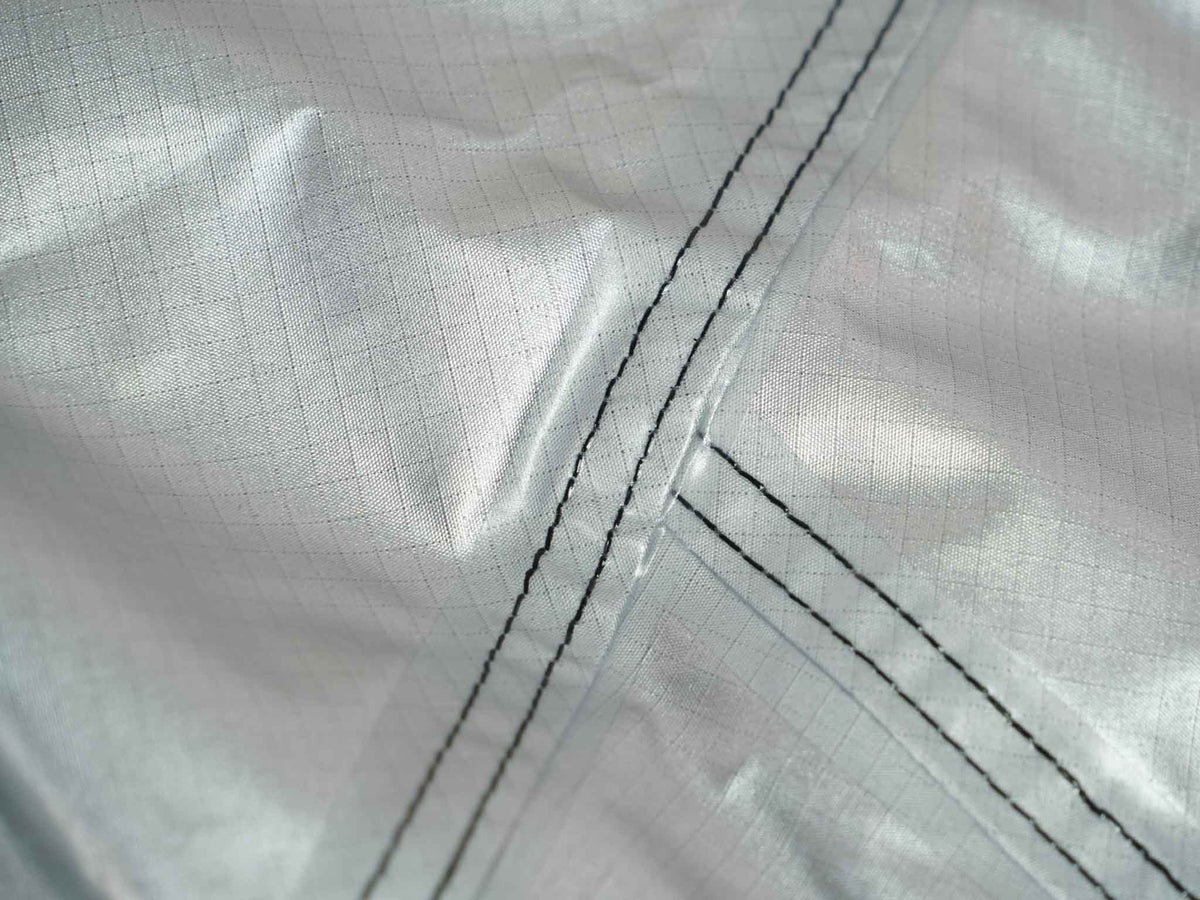 C6 Rev Tent storm cover – ripstop fabric and seam close-up