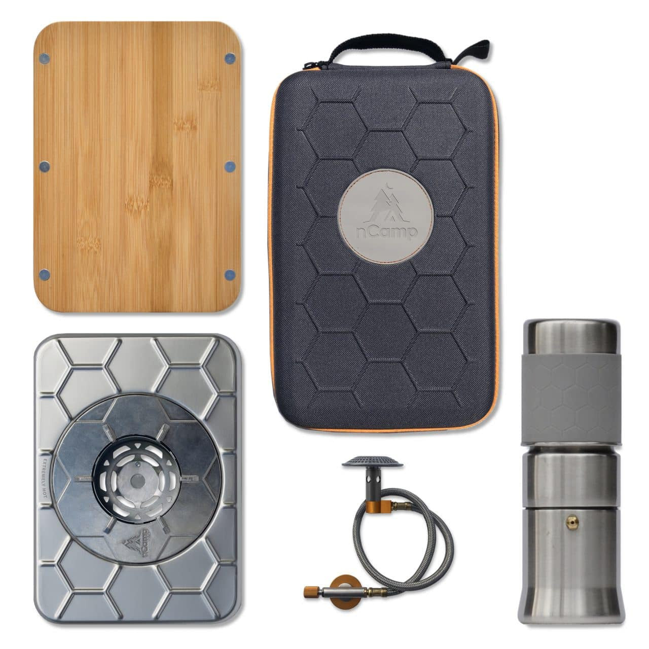 Collection of outdoor cooking and travel gear including a cutting board, hexagonal case, stove, and insulated container.