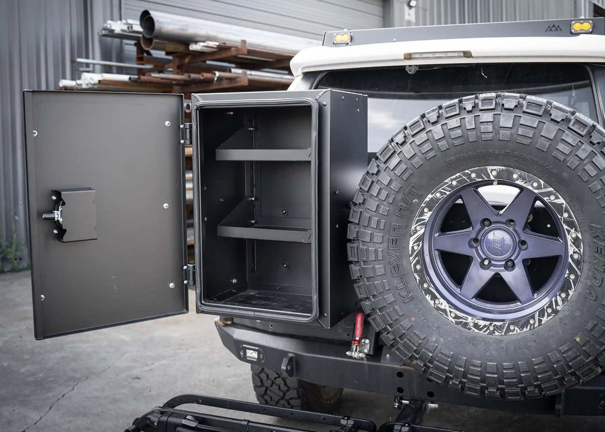 Universal Overland Storage Box interior with the adjustable shelf installed