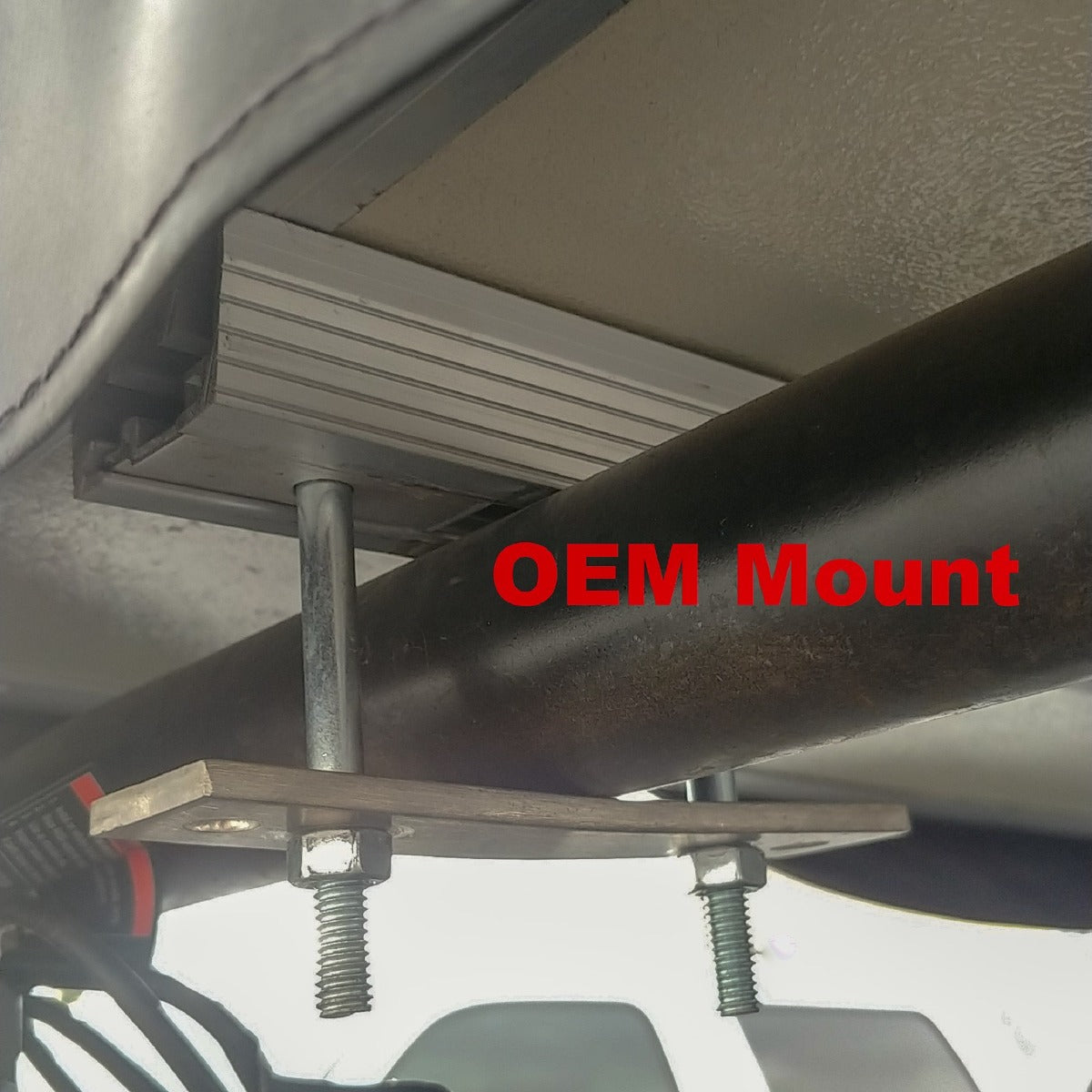 Stock tent mounting plate labeled OEM Mount for comparison