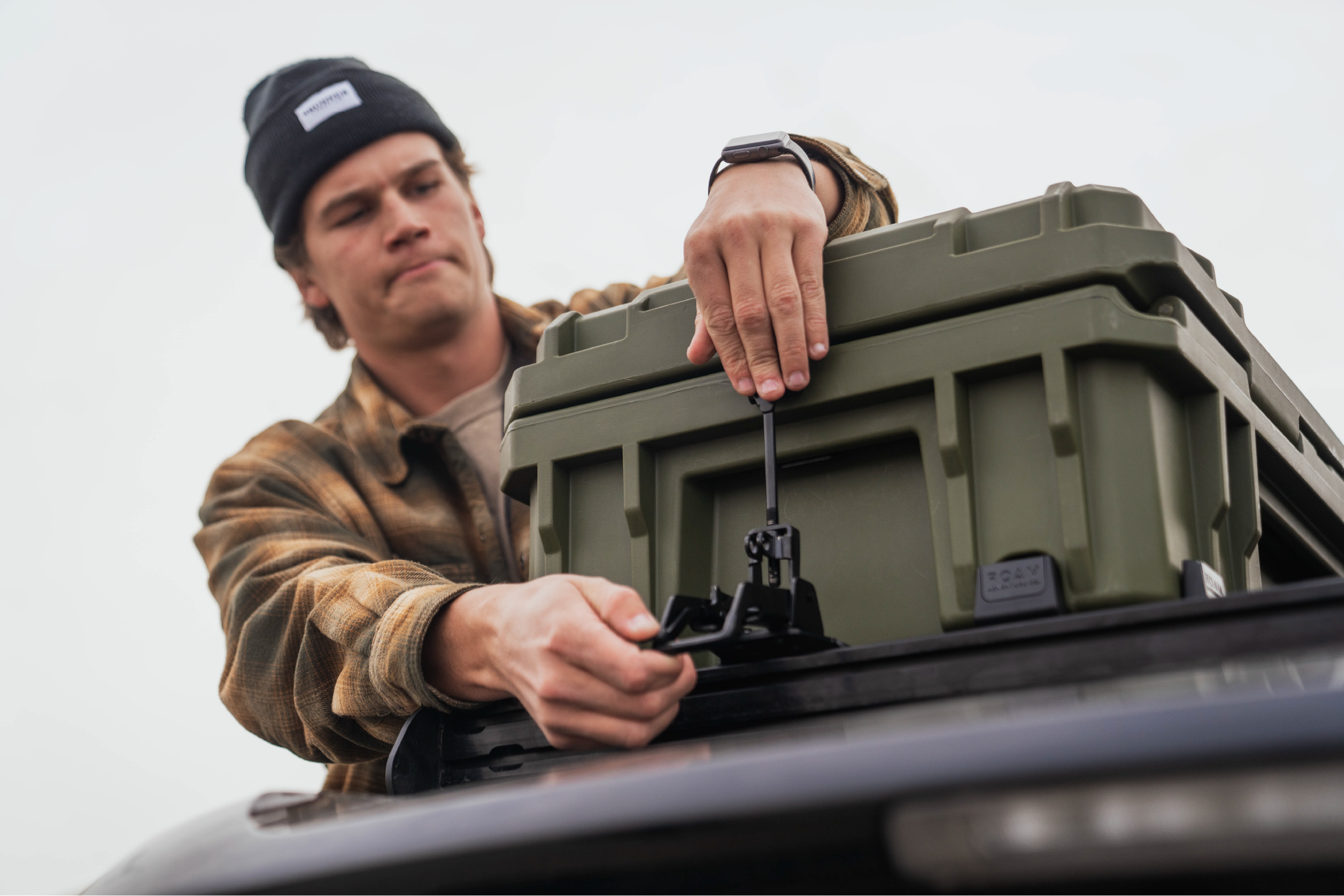 95L Rugged Case secured on a roof rack with ROAM Rugged Mounts