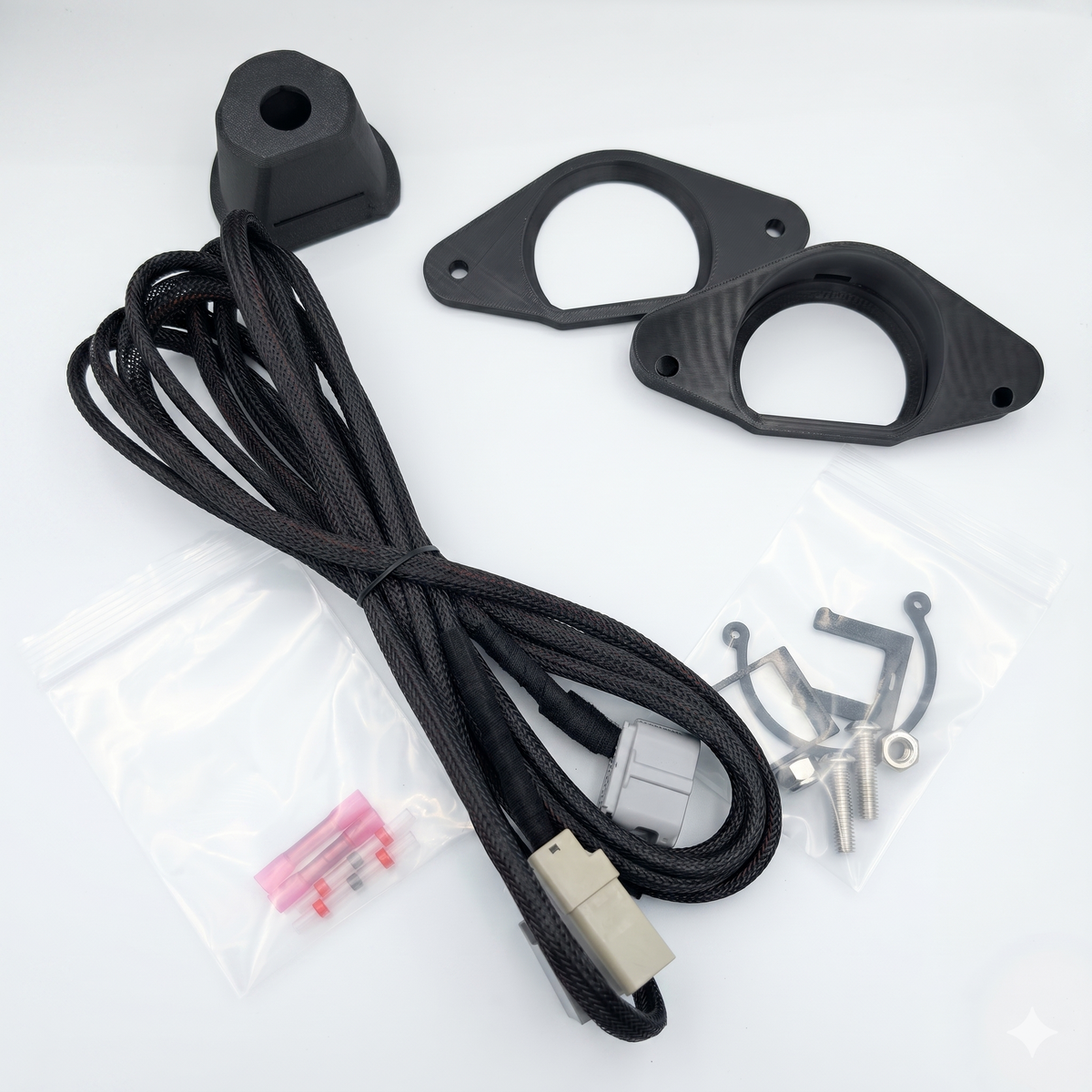 GG Offroad Tacoma tailgate camera relocation kit with braided cable, mount, bezels and heat shrink