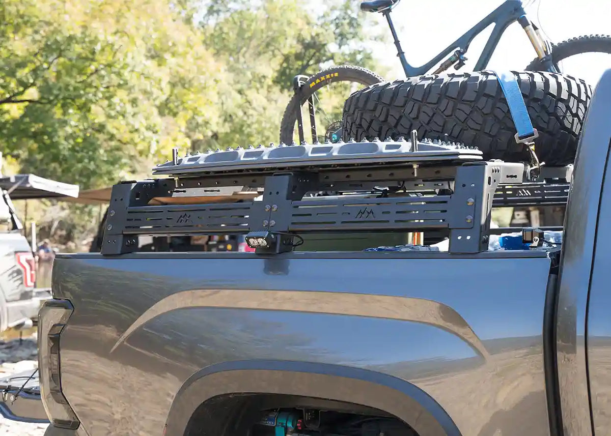 Toyota Tundra Mid Height bed rack in use, loaded with gear