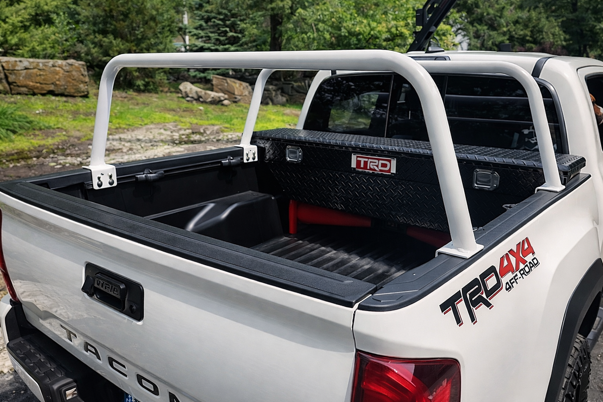 White HMOR bed bars installed on a white Tacoma bed with no tent