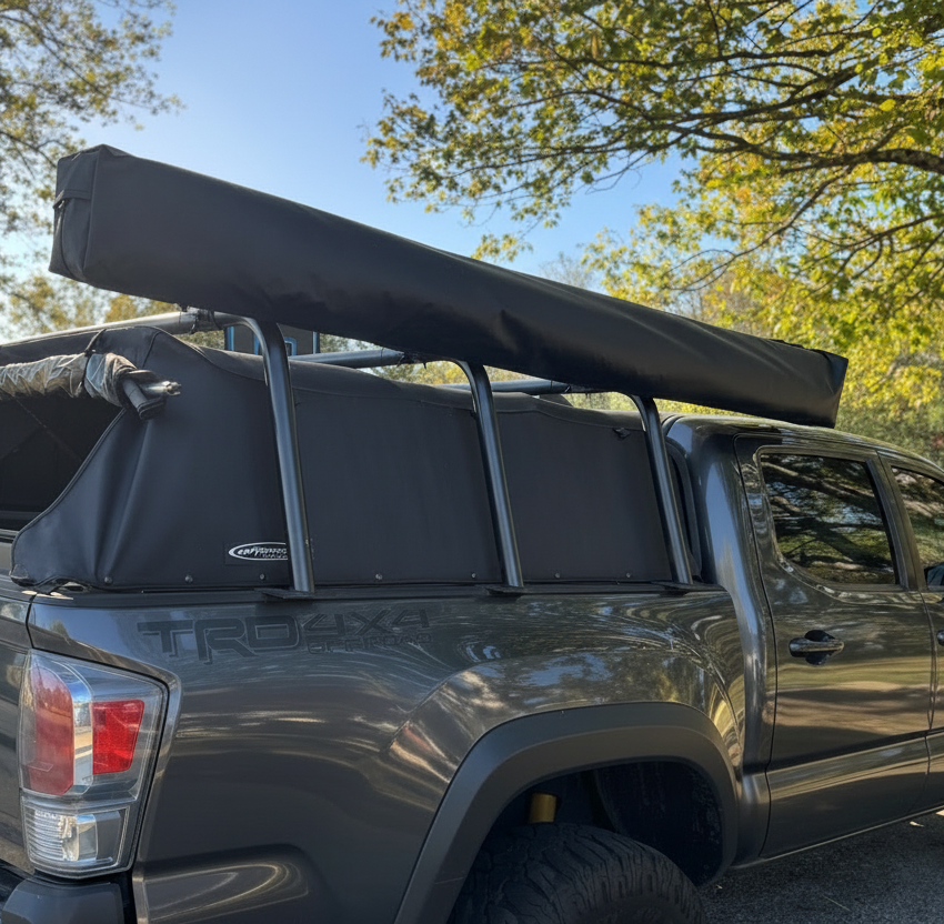 Close view of HMOR bed bars clearing a Softopper bed cover on a Tacoma