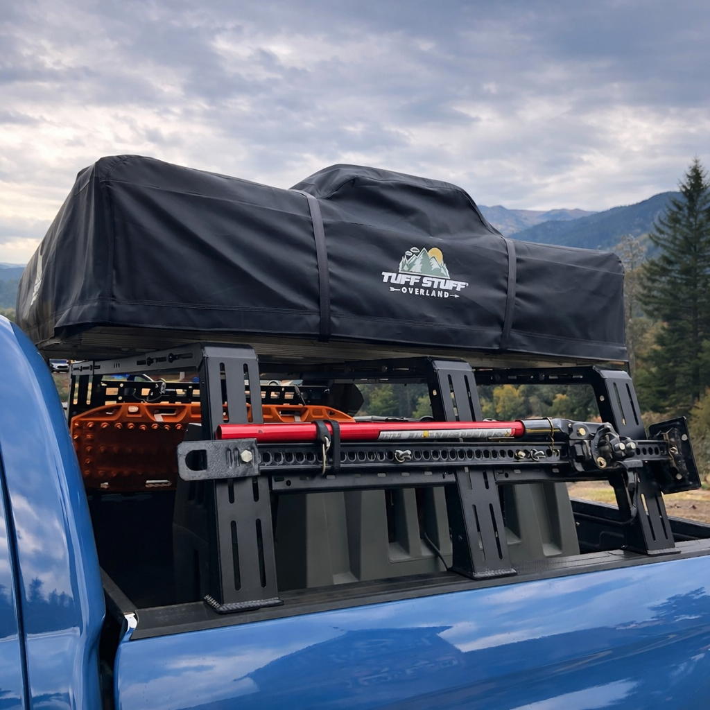 ROCK-IT rack with soft tent and Hi-Lift jack on a blue Tundra