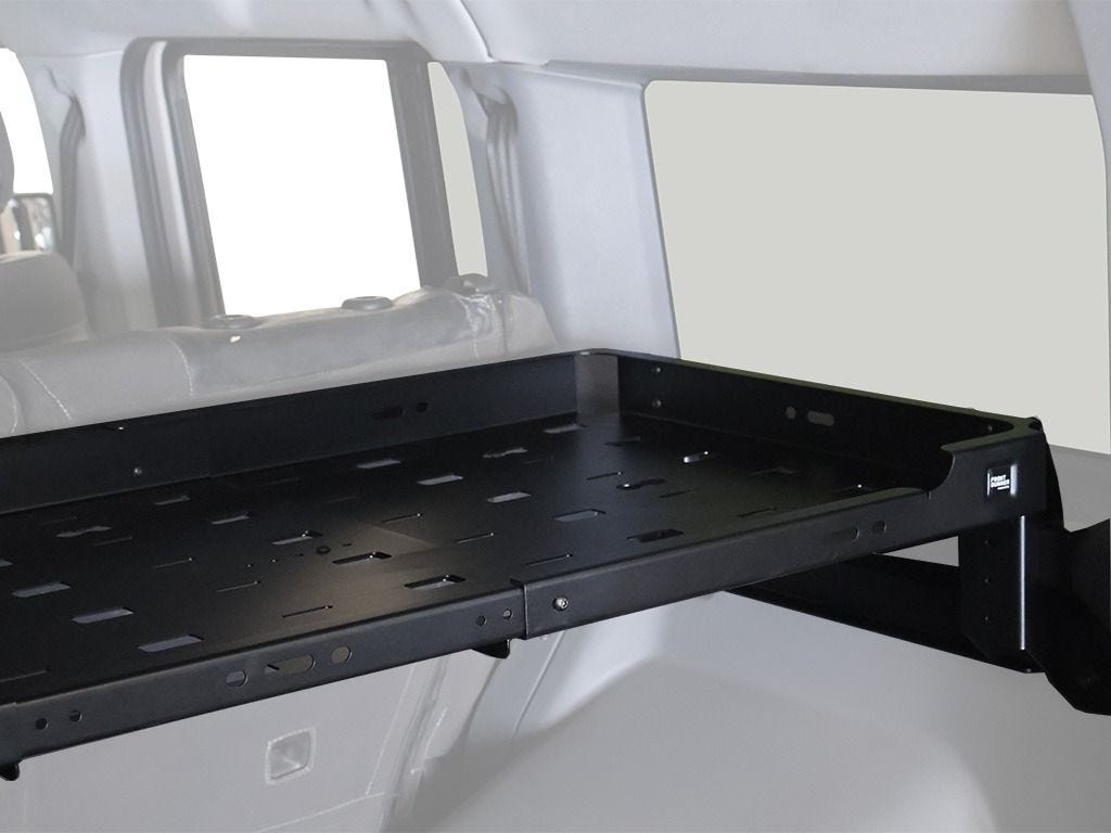 Close-up of the slotted steel deck and Front Runner badge on the Grenadier Cargo Molle Interior Shelf